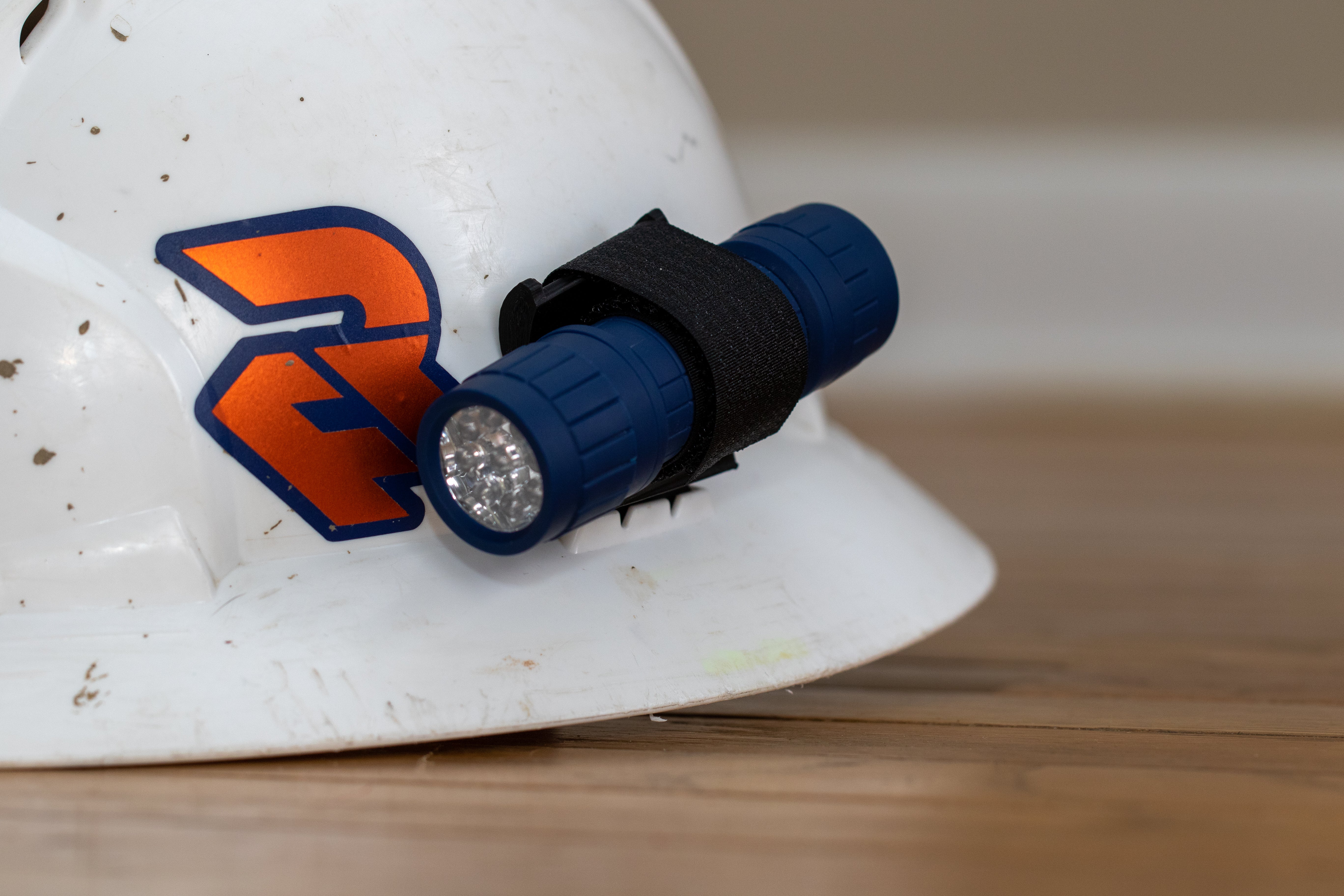 Hard hat cheap flashlight holder